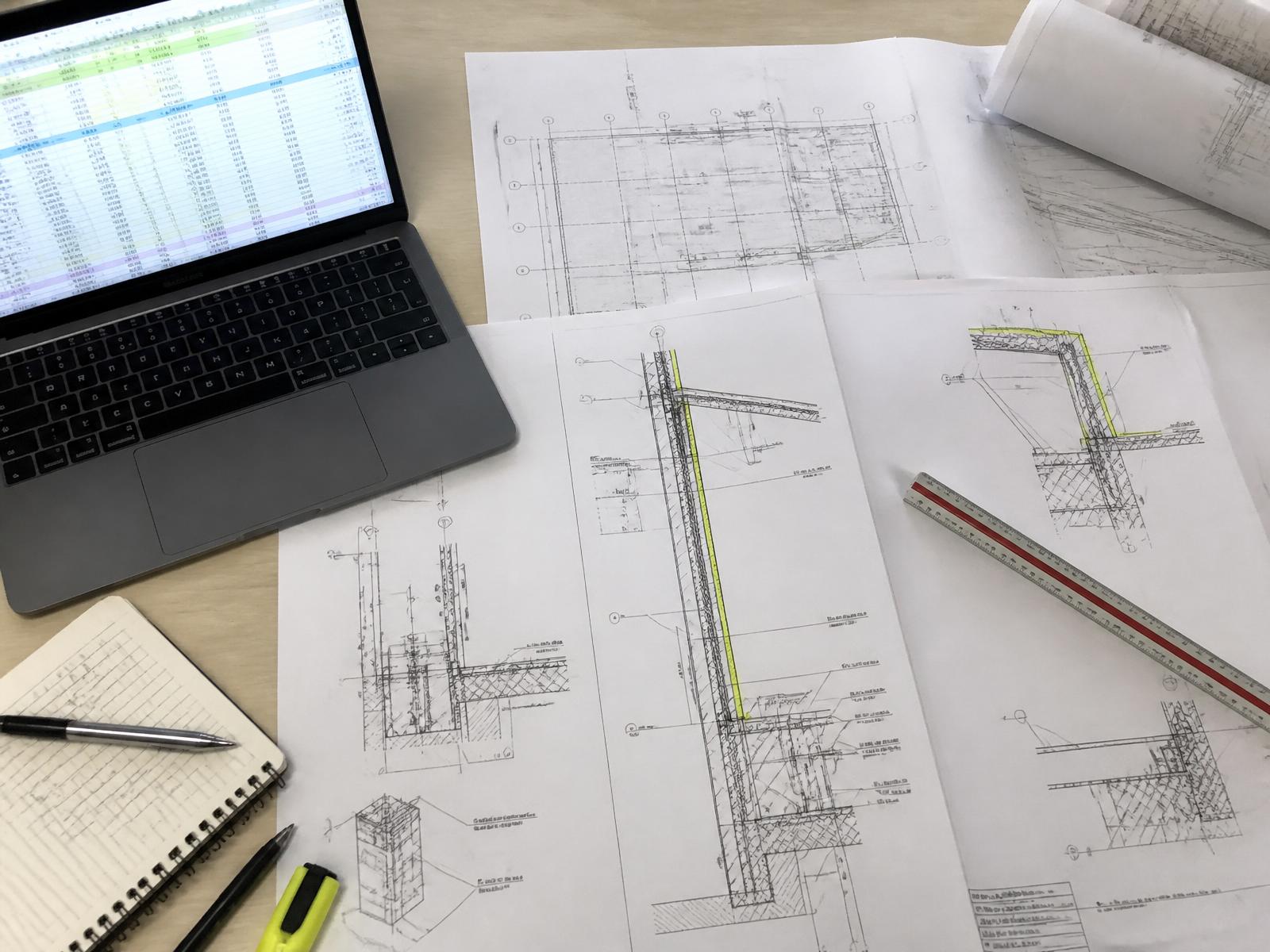 Architectural blueprint drawings with scale rule and dimension callouts